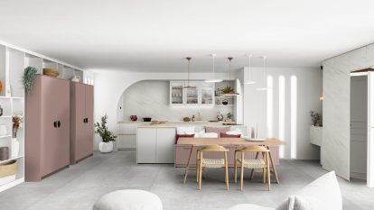 Une cuisine avec îlot central et table intégrée, c'est possible